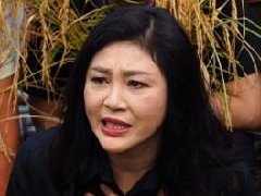 泰国前总理英拉泪洒四色菊府 无力偿还政策失职赔偿金